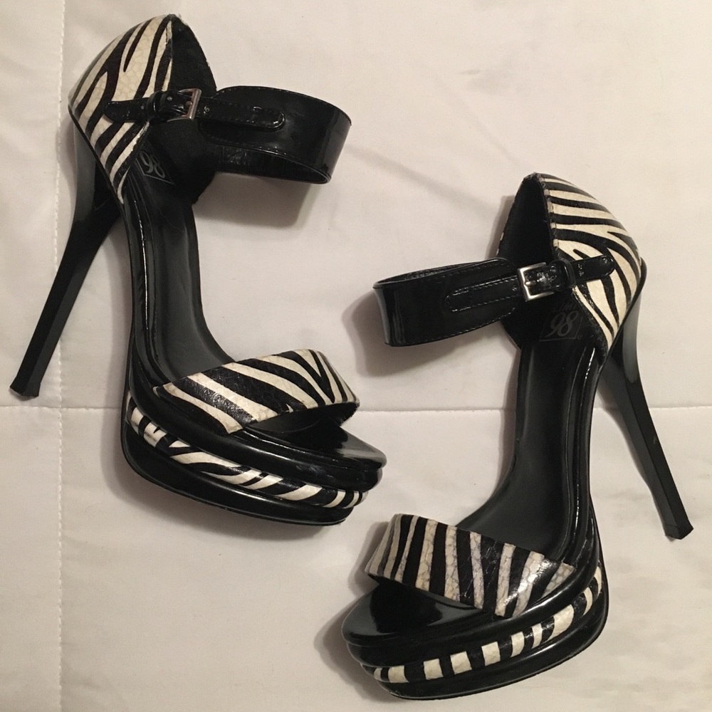 Zebra print/black heels.